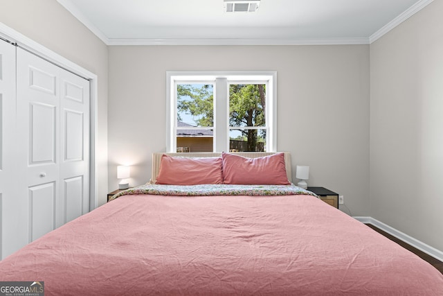 73 Fair St, Newnan, GA 30263 - bedroom featuring crown molding, baseboards, and wood finished floors
