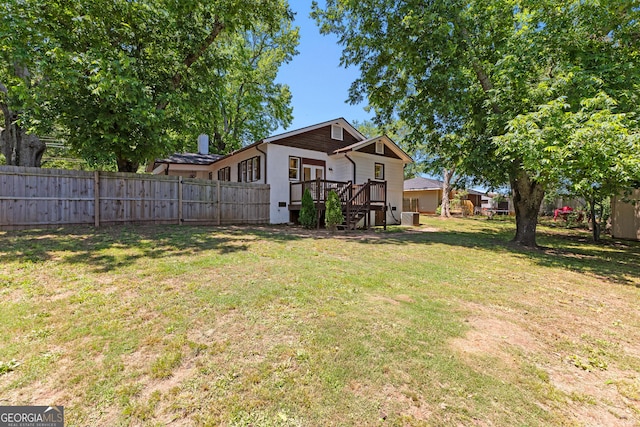 73 Fair St, Newnan, GA 30263 - view of yard with a wooden deck and stairs
