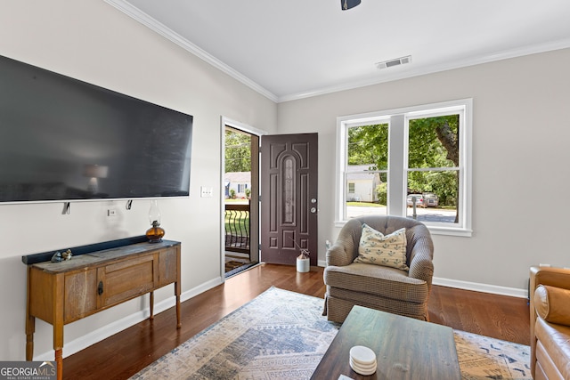 73 Fair St, Newnan, GA 30263 - living room featuring ornamental molding, baseboards, and wood finished floors