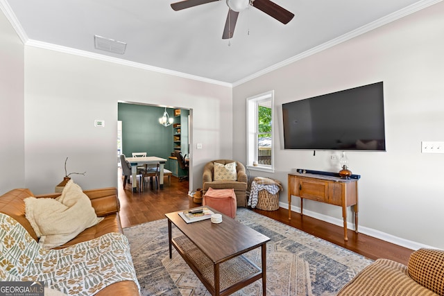73 Fair St, Newnan, GA 30263 - living area with crown molding, wood finished floors, a ceiling fan, and baseboards