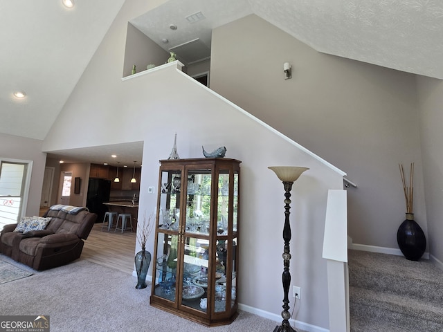 1356 Woodbrier, Sautee Nacoochee, GA 30571 - stairway featuring carpet flooring, plenty of natural light, high vaulted ceiling, and recessed lighting