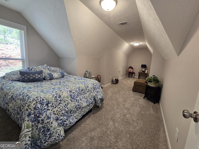 1356 Woodbrier, Sautee Nacoochee, GA 30571 - bedroom with vaulted ceiling, carpet floors, baseboards, and a textured ceiling