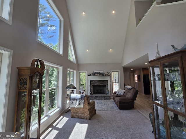 1356 Woodbrier, Sautee Nacoochee, GA 30571 - carpeted living room featuring high vaulted ceiling, a stone fireplace, and recessed lighting