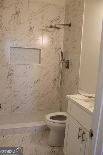 4220 Glad Morning Dr, College Park, GA 30349 - bathroom with a stall shower, vanity, toilet, and marble finish flooring