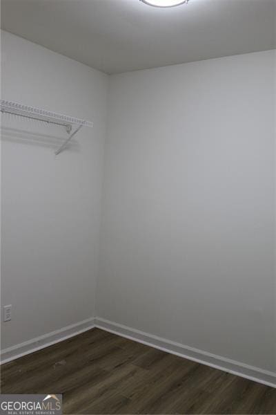 4220 Glad Morning Dr, College Park, GA 30349 - walk in closet with dark wood finished floors