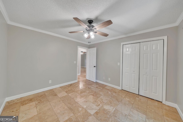 112 White Oak Cir, Dublin, GA 31021 - unfurnished bedroom with crown molding, baseboards, ceiling fan, a closet, and a textured ceiling