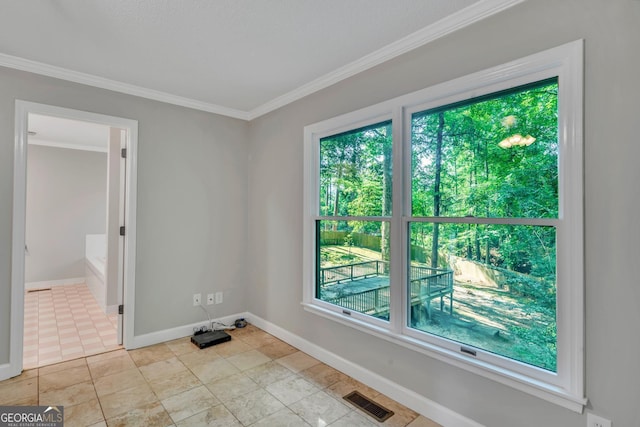 112 White Oak Cir, Dublin, GA 31021 - empty room featuring plenty of natural light, ornamental molding, and baseboards