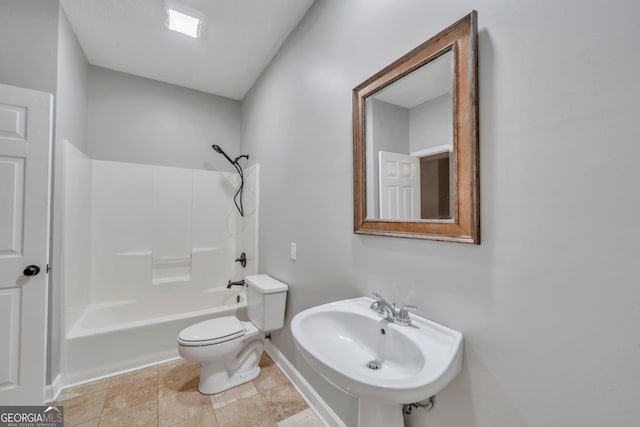 112 White Oak Cir, Dublin, GA 31021 - full bathroom with toilet, a sink, baseboards, and tub / shower combination