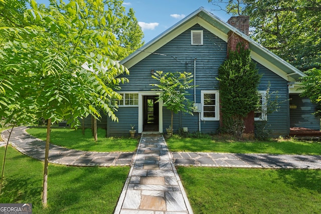 13795 Arnold Mill Rd, Roswell, GA 30075 - view of front of house with a chimney and a front yard