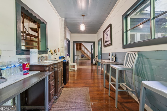 13795 Arnold Mill Rd, Roswell, GA 30075 - hallway featuring a sink, dark wood-style floors, stairway, and wooden walls