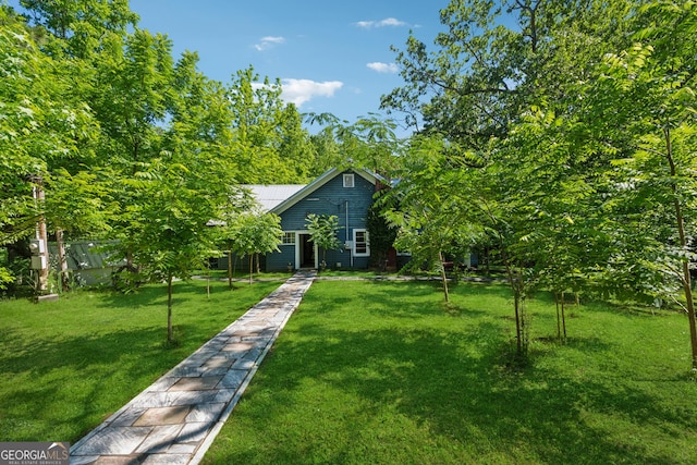 13795 Arnold Mill Rd, Roswell, GA 30075 - view of front of house with a front yard and metal roof