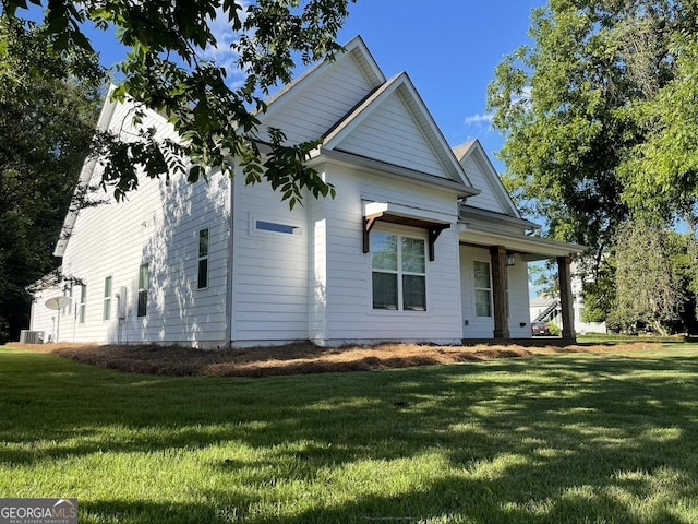 15785 Concord St, Zebulon, GA 30295 - view of front facade featuring a front yard and cooling unit