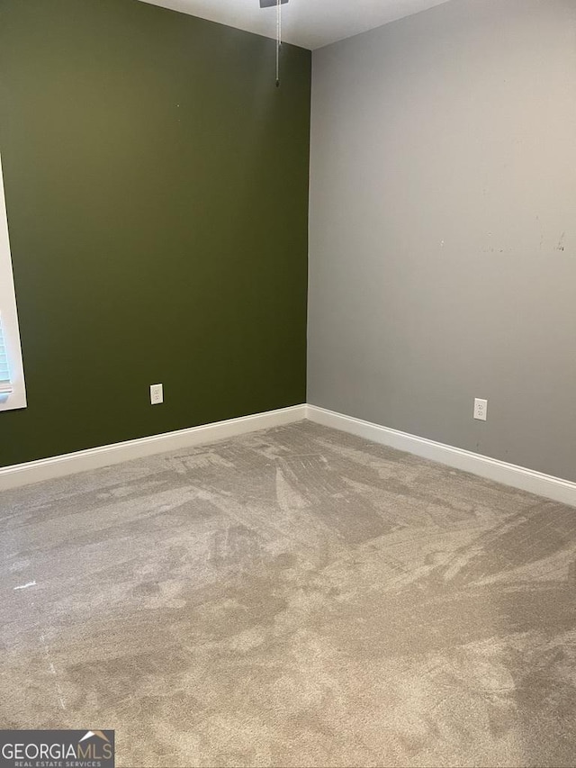 15785 Concord St, Zebulon, GA 30295 - spare room featuring carpet floors and baseboards