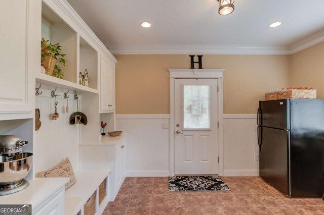 901 Providence Ln, Monroe, GA 30656 - mudroom with wainscoting, ornamental molding, and light tile patterned floors