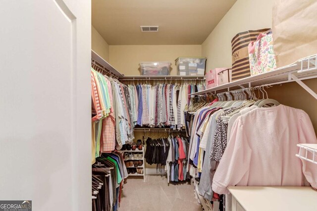 901 Providence Ln, Monroe, GA 30656 - walk in closet featuring carpet floors