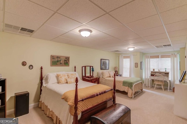 901 Providence Ln, Monroe, GA 30656 - bedroom with a drop ceiling, light colored carpet, and baseboards