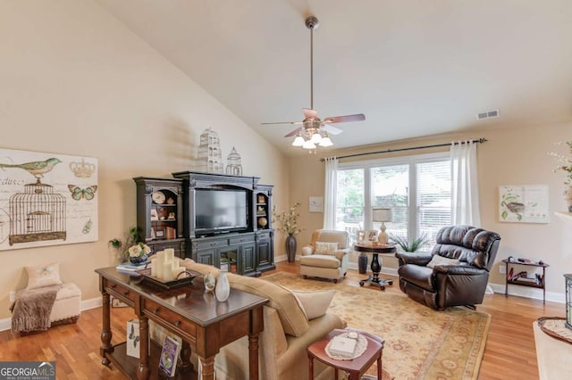 901 Providence Ln, Monroe, GA 30656 - living area with light wood finished floors, ceiling fan, lofted ceiling, and baseboards