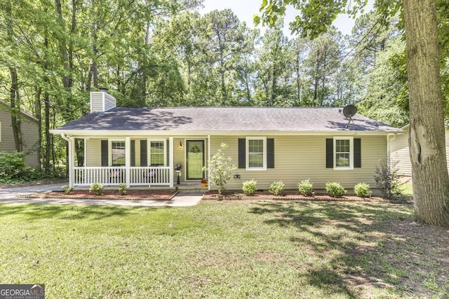 642 Chickamauga Dr, Macon, GA 31220 - single story home featuring a porch, a chimney, and a front lawn