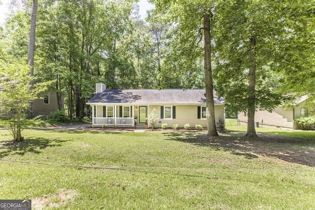 642 Chickamauga Dr, Macon, GA 31220 - single story home with covered porch, a chimney, and a front yard
