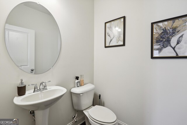 178 Munira Ln SW, South Fulton, GA 30331 - bathroom with toilet and baseboards