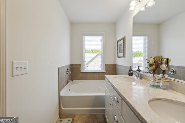 178 Munira Ln SW, South Fulton, GA 30331 - bathroom with a bath, double vanity, and tile patterned floors