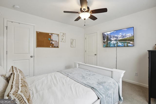 178 Munira Ln SW, South Fulton, GA 30331 - bedroom featuring light carpet, a ceiling fan, and baseboards