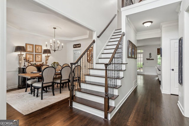 750 Highview Ct, Woodstock, GA 30189 - stairs with wood finished floors, ornamental molding, a chandelier, and baseboards