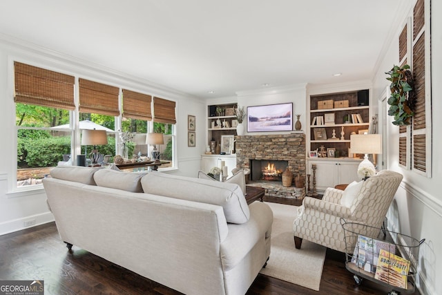 750 Highview Ct, Woodstock, GA 30189 - living area with healthy amount of natural light, a fireplace, ornamental molding, and dark wood finished floors