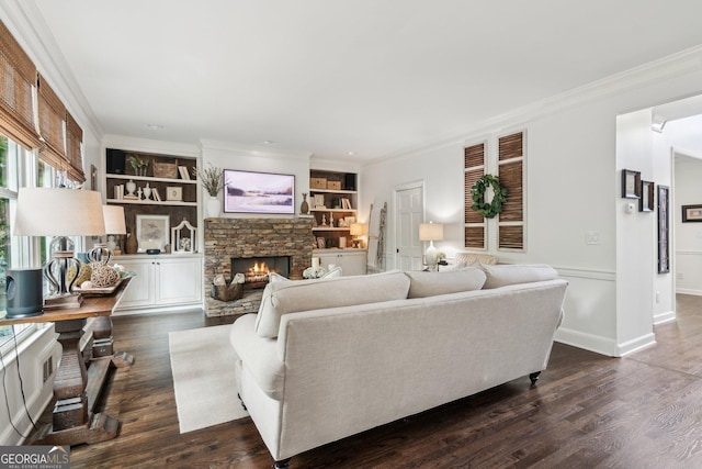 750 Highview Ct, Woodstock, GA 30189 - living room featuring a fireplace, ornamental molding, dark wood-type flooring, built in features, and baseboards