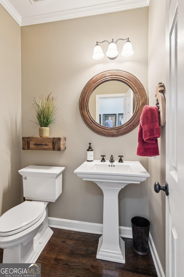 750 Highview Ct, Woodstock, GA 30189 - bathroom with wood finished floors, toilet, crown molding, and baseboards