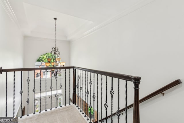 750 Highview Ct, Woodstock, GA 30189 - staircase featuring a chandelier, a raised ceiling, and crown molding