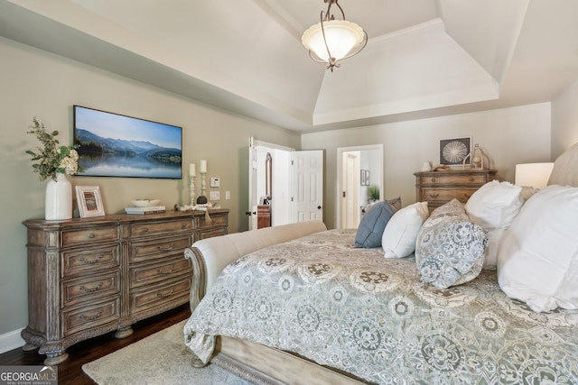 750 Highview Ct, Woodstock, GA 30189 - bedroom with dark wood-type flooring, a raised ceiling, and baseboards