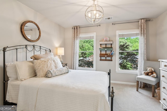 750 Highview Ct, Woodstock, GA 30189 - carpeted bedroom featuring a chandelier and baseboards