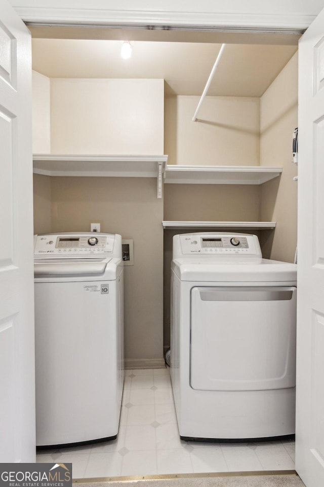 750 Highview Ct, Woodstock, GA 30189 - laundry area with washer and clothes dryer