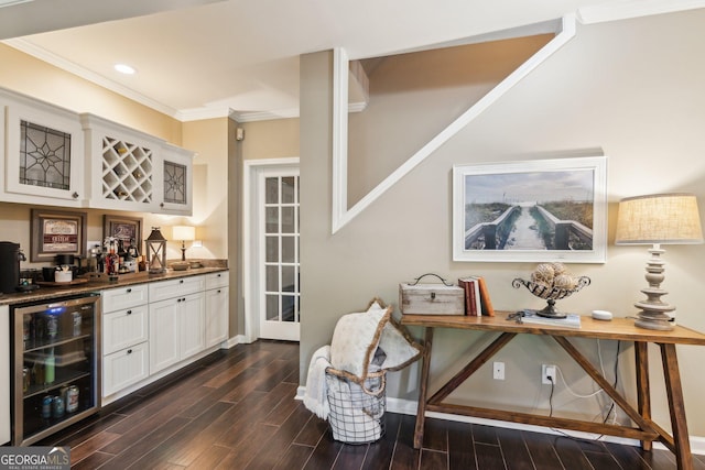750 Highview Ct, Woodstock, GA 30189 - indoor bar with beverage cooler, dark wood-type flooring, crown molding, baseboards, and recessed lighting
