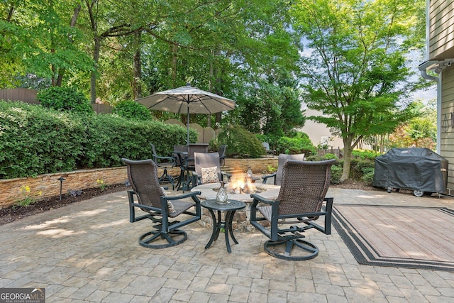 750 Highview Ct, Woodstock, GA 30189 - view of patio featuring a fire pit and grilling area