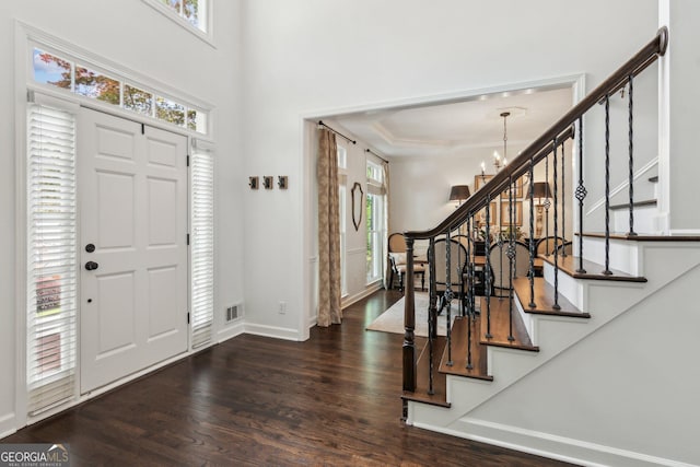 750 Highview Ct, Woodstock, GA 30189 - entrance foyer with stairs, wood finished floors, a chandelier, healthy amount of natural light, and ornamental molding