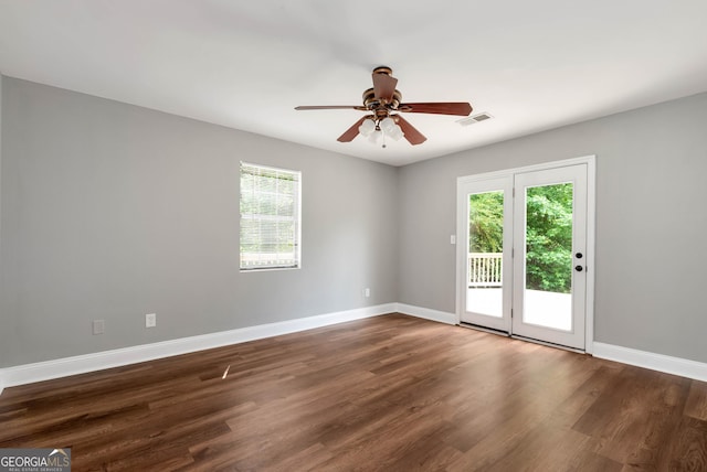 166 Walnut Cv, Dawsonville, GA 30534 - spare room featuring ceiling fan, baseboards, and wood finished floors