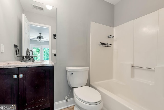 166 Walnut Cv, Dawsonville, GA 30534 - full bathroom with vanity, toilet, baseboards, ceiling fan, and bathtub / shower combination