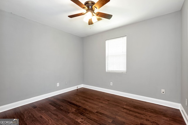 166 Walnut Cv, Dawsonville, GA 30534 - unfurnished room with baseboards, dark wood-style flooring, and ceiling fan