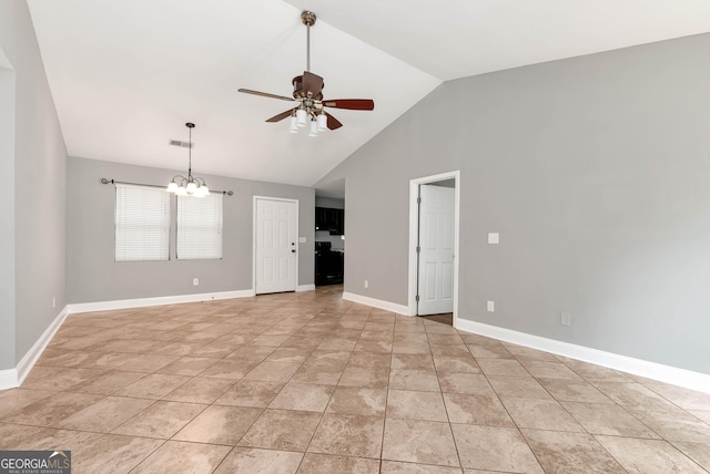 166 Walnut Cv, Dawsonville, GA 30534 - unfurnished room with ceiling fan, a chandelier, baseboards, and high vaulted ceiling