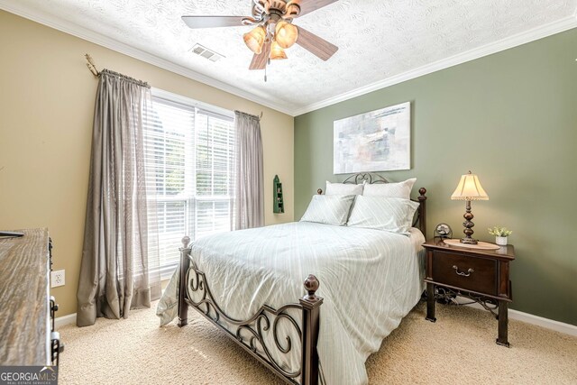 435 Flowering Trl, Grayson, GA 30017 - bedroom with light colored carpet, baseboards, ornamental molding, a textured ceiling, and ceiling fan