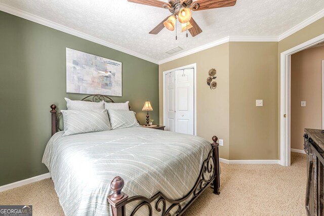 435 Flowering Trl, Grayson, GA 30017 - bedroom featuring light carpet, a closet, baseboards, a textured ceiling, and ceiling fan