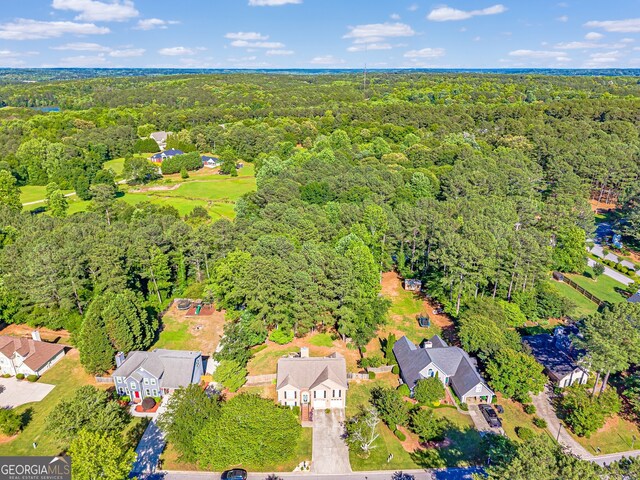 435 Flowering Trl, Grayson, GA 30017 - aerial perspective of suburban area featuring a heavily wooded area