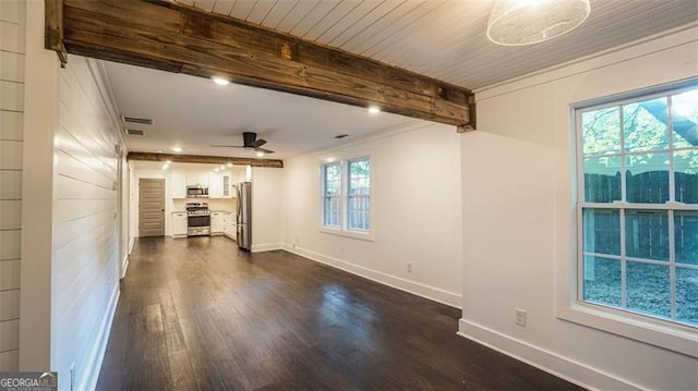 4443 Toonigh Rd, Acworth, GA 30101 - unfurnished living room featuring dark wood finished floors, beam ceiling, a ceiling fan, baseboards, and ornamental molding