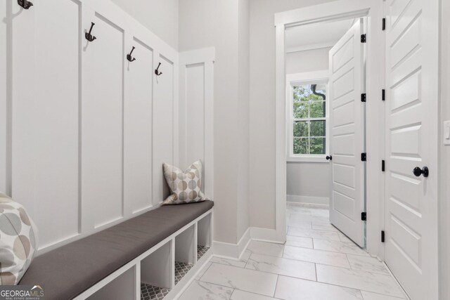 210 Birmingham Rd, Ball Ground, GA 30107 - mudroom featuring light marble finish floors and baseboards
