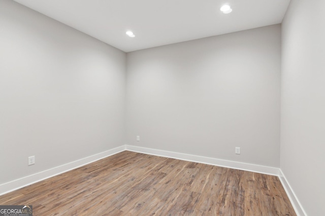 210 Birmingham Rd, Ball Ground, GA 30107 - unfurnished room with wood finished floors, baseboards, and recessed lighting