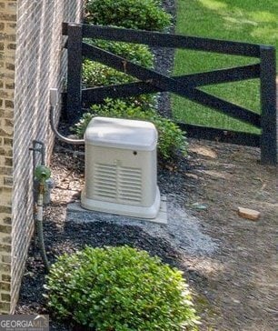 210 Birmingham Rd, Ball Ground, GA 30107 - exterior view of a power unit and brick siding
