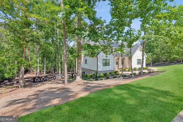 210 Birmingham Rd, Ball Ground, GA 30107 - view of front of property with metal roof and board and batten siding
