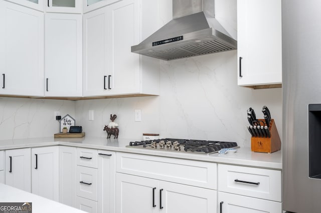 3537 Edenridge Ct, Buford, GA 30519 - kitchen with wall chimney range hood, decorative backsplash, and light countertops